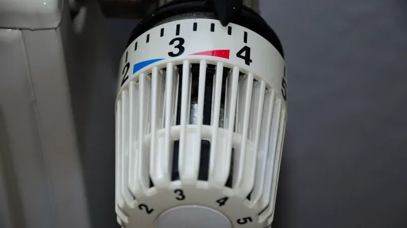 Close-up of a thermostatic radiator valve set to 3