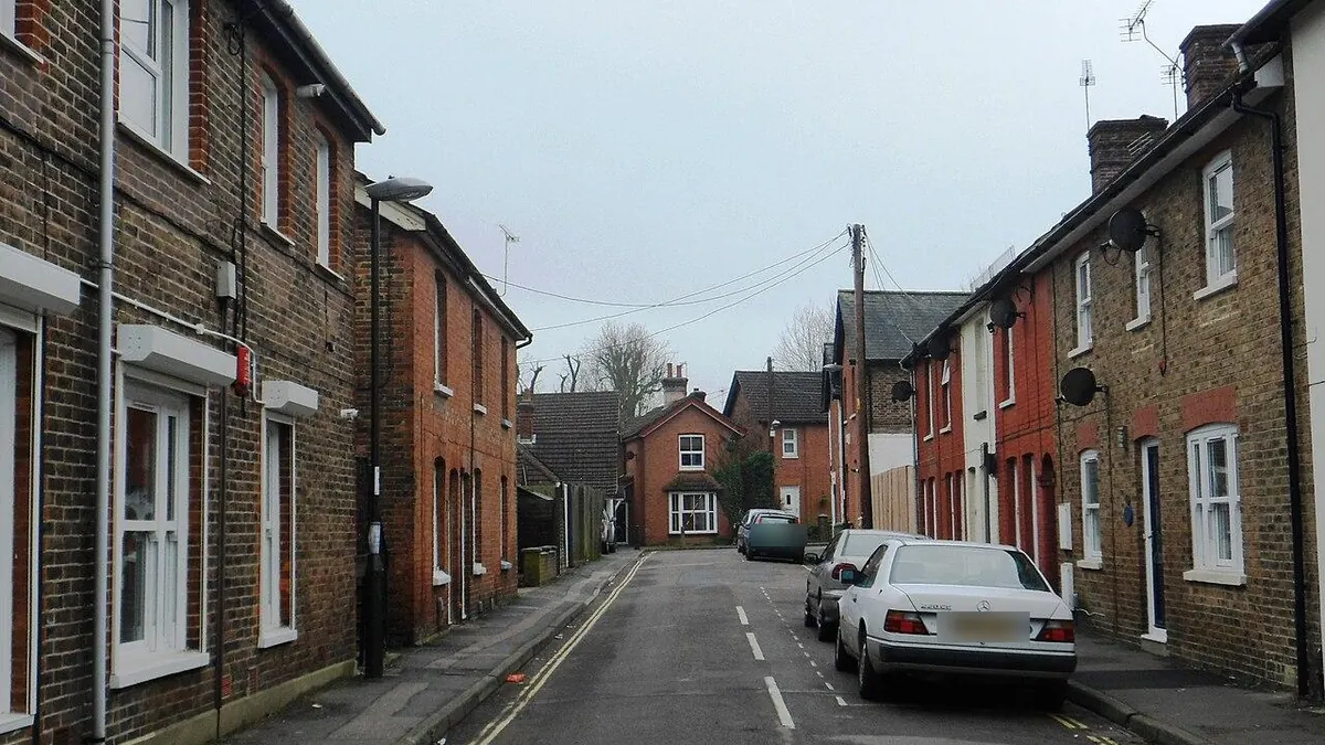 Street of Victorian brick terraced houses in England